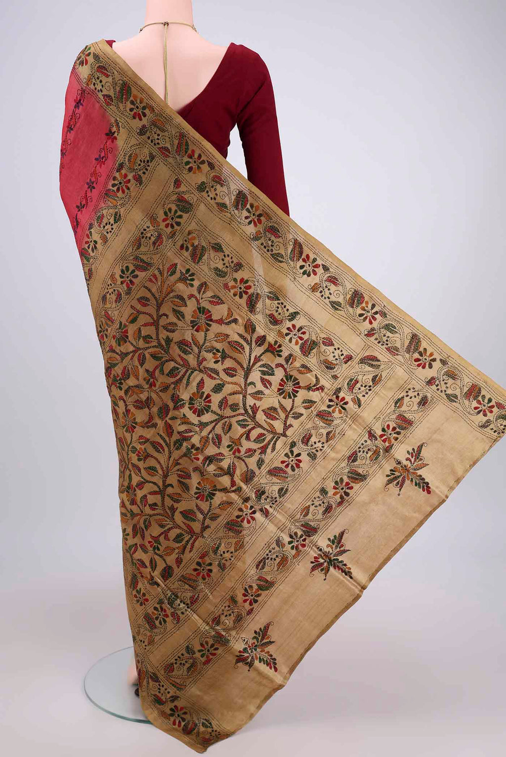 Flat view of Dark Pink Kantha Silk Saree with Kantha Work on the body and Thread Border. 