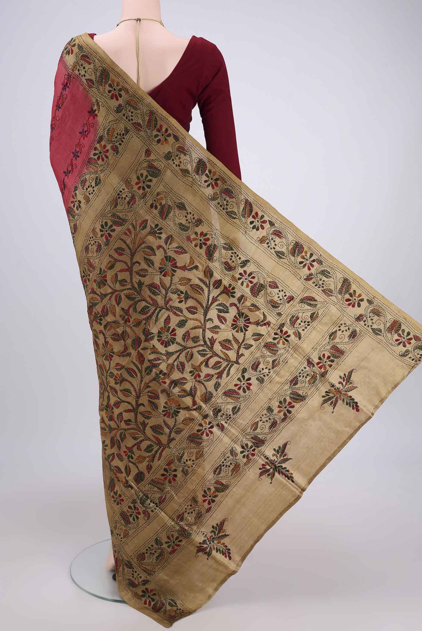 Flat view of Dark Pink Kantha Silk Saree with Kantha Work on the body and Thread Border. 