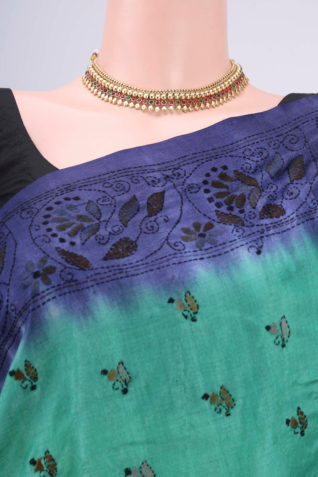Border image of Sea Green Kantha Silk Saree with Kantha Work on the body and Thread Border. 