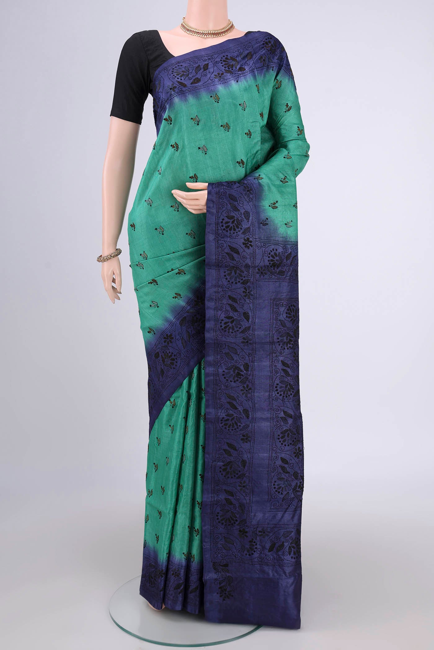 Sea Green Kantha Silk Saree with Kantha Work on the body and Thread Border.  displayed on a mannequin