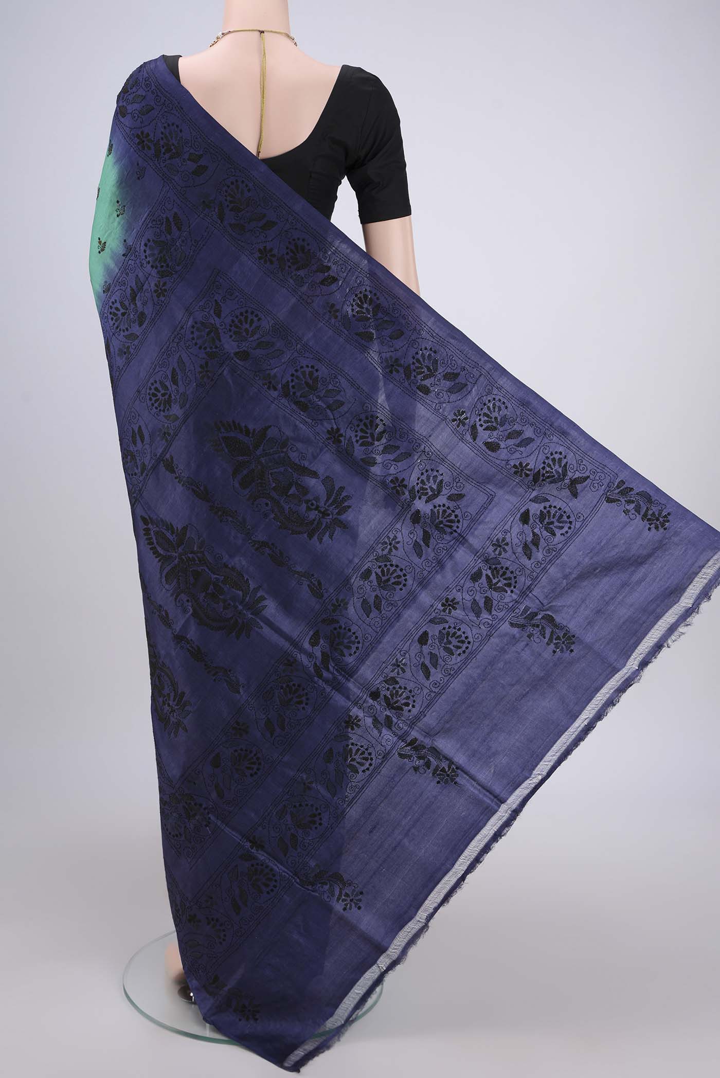 Flat view of Sea Green Kantha Silk Saree with Kantha Work on the body and Thread Border. 