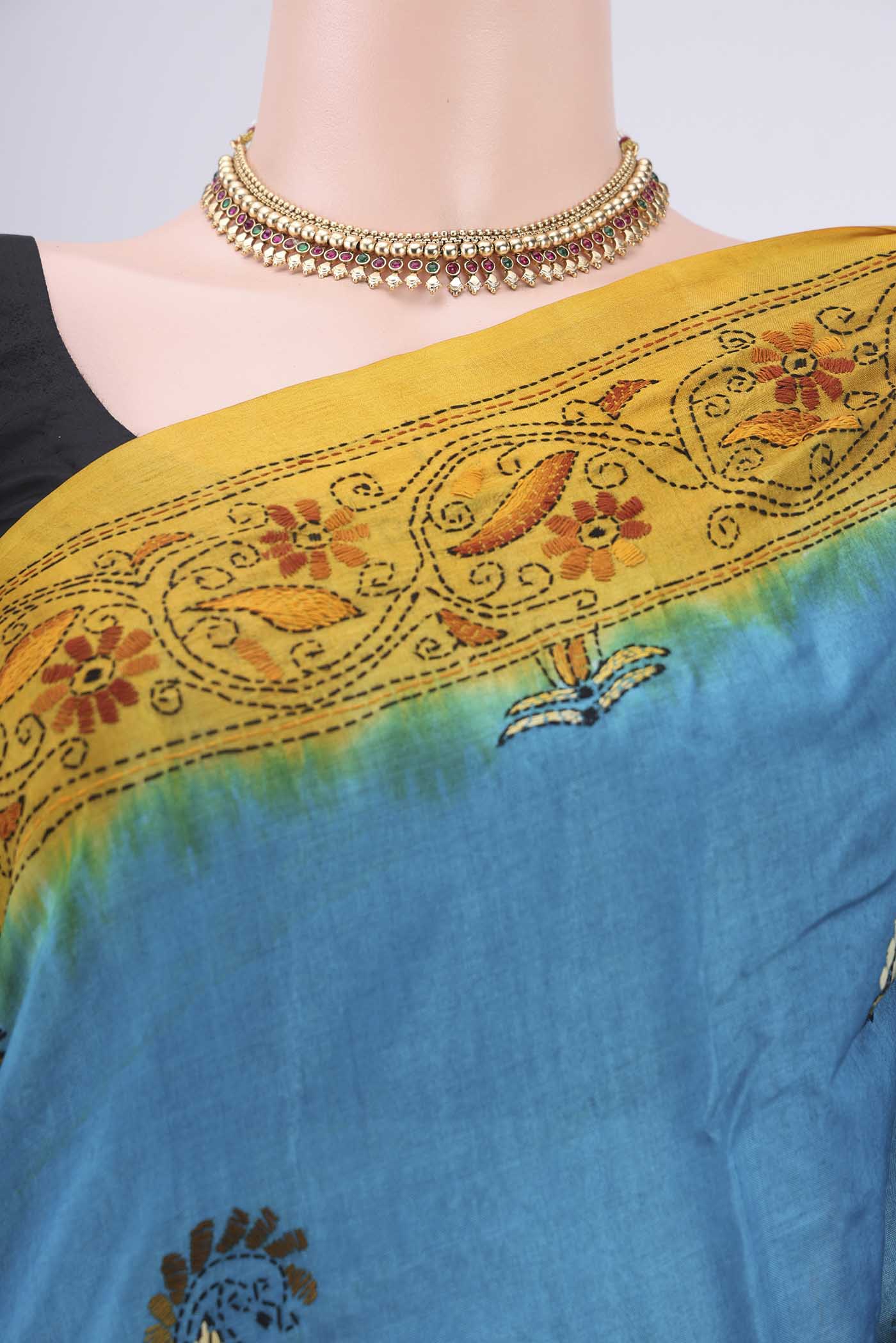 Border image of Blue Kantha Silk Saree with Kantha Work on the body and Thread Border. 