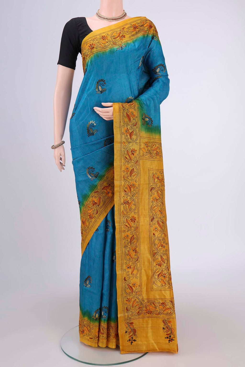 Blue Kantha Silk Saree with Kantha Work on the body and Thread Border.  displayed on a mannequin