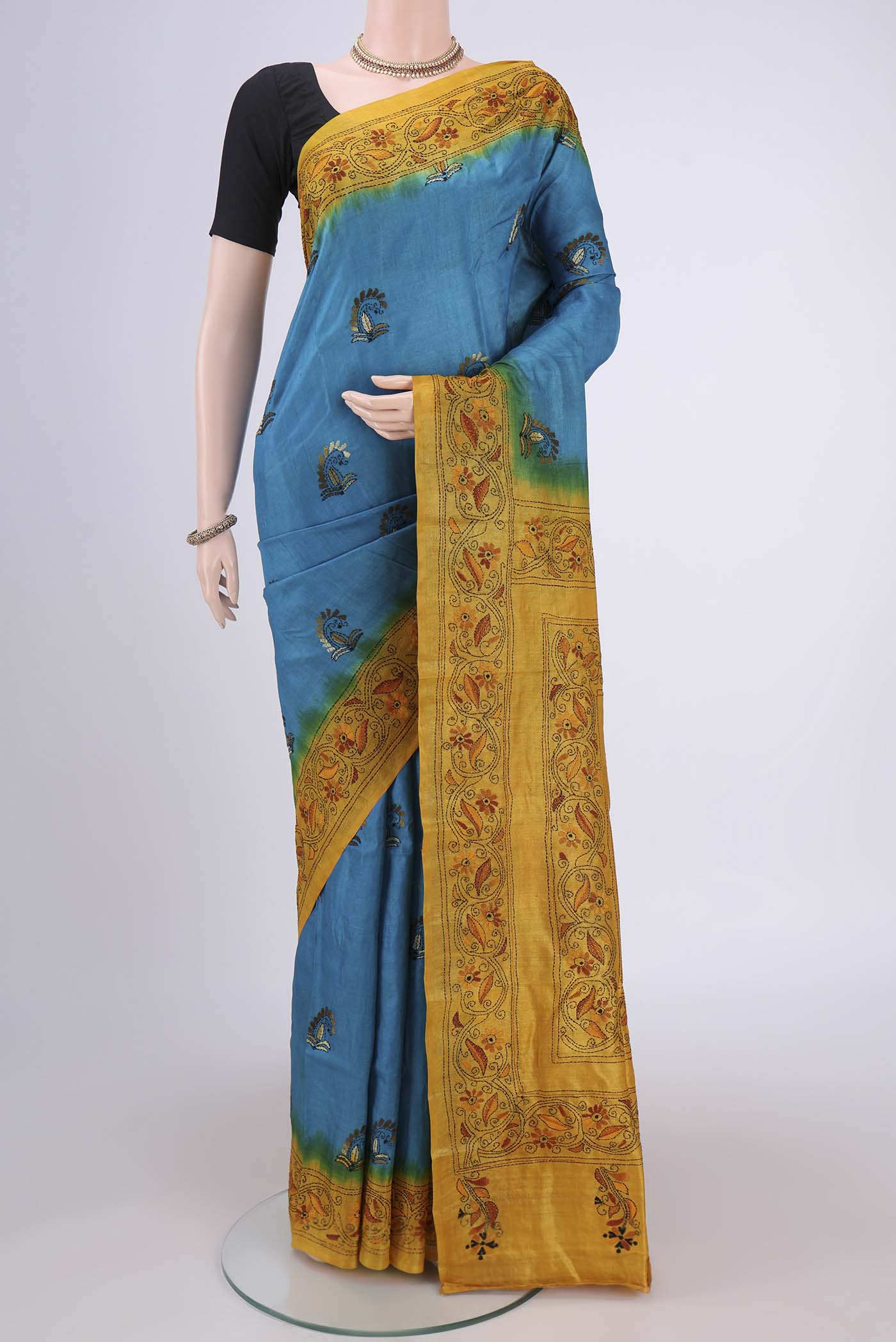 Blue Kantha Silk Saree with Kantha Work on the body and Thread Border.  displayed on a mannequin