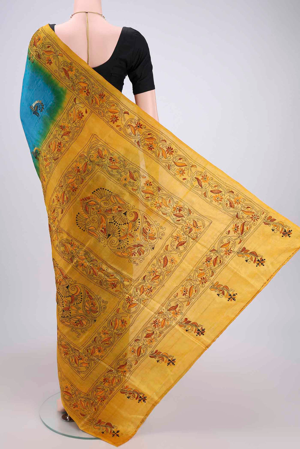 Flat view of Blue Kantha Silk Saree with Kantha Work on the body and Thread Border. 