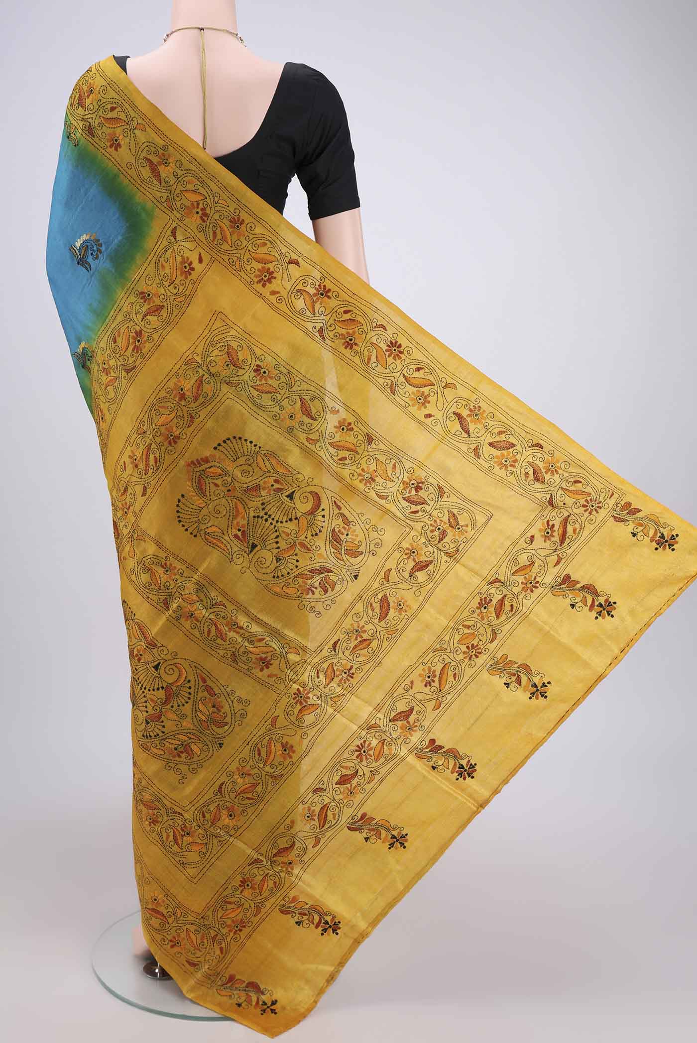 Flat view of Blue Kantha Silk Saree with Kantha Work on the body and Thread Border. 