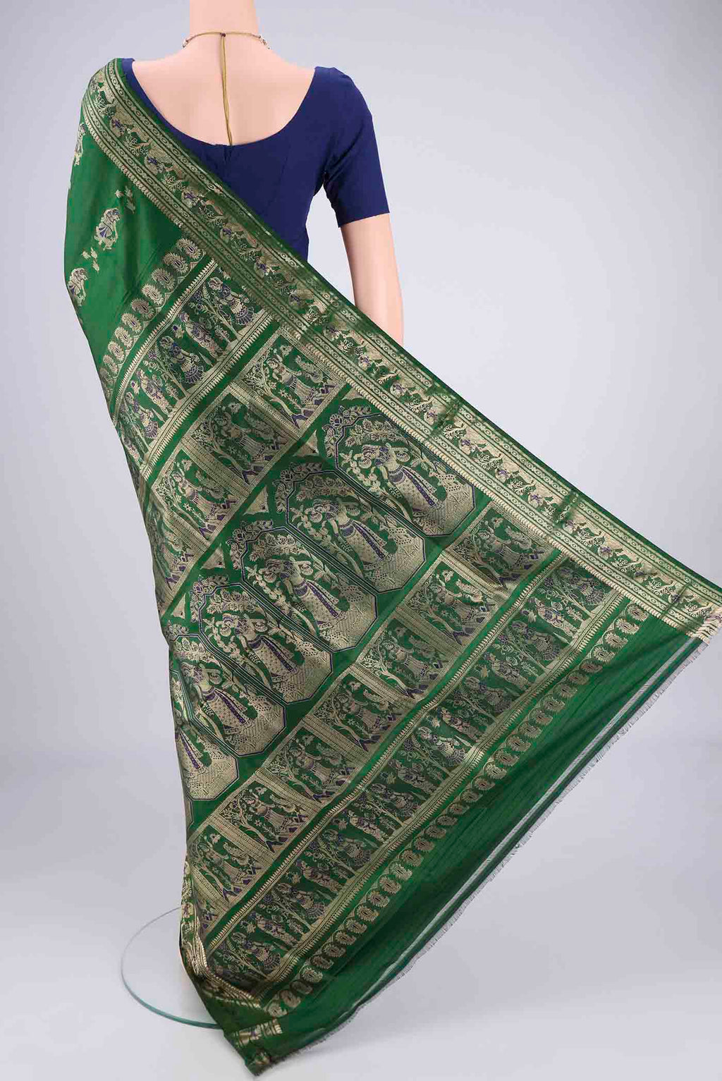 Flat view of Bottle Green Baluchari Silk Saree with Zari And Thread Butta on the body and Zari And Thread Border. 