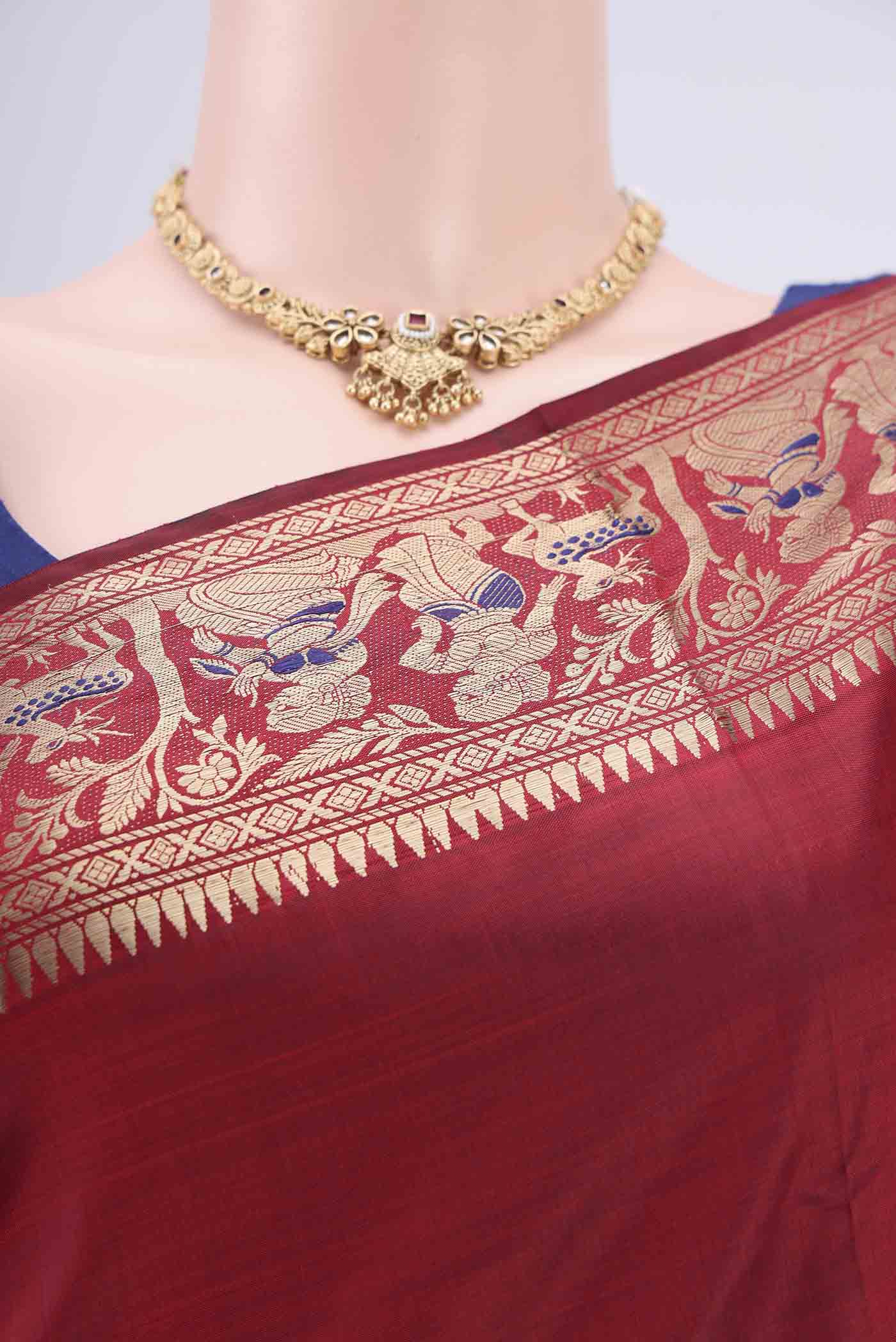 Border image of Maroon Baluchari Silk Saree with Zari And Thread Butta on the body and Zari And Thread Border. 
