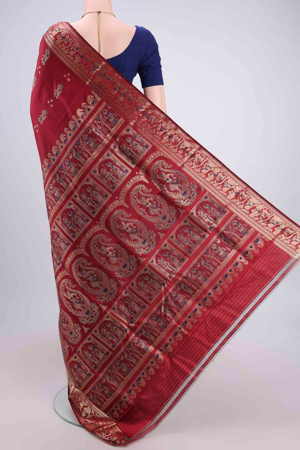 Flat view of Maroon Baluchari Silk Saree with Zari And Thread Butta on the body and Zari And Thread Border. 