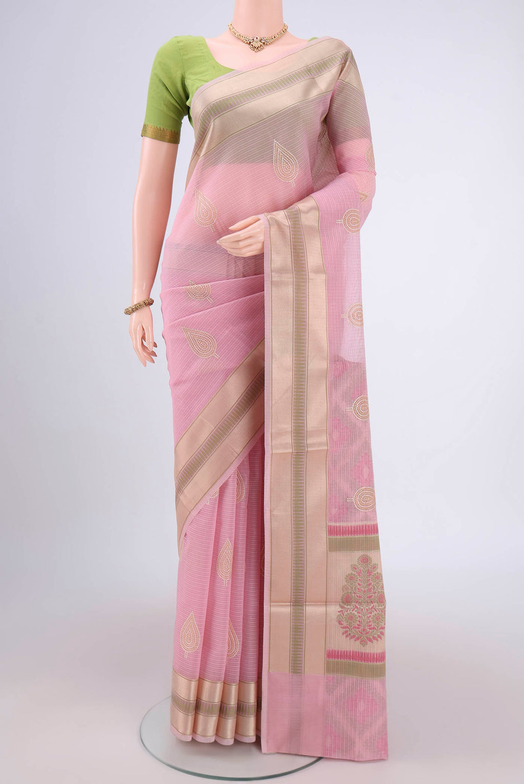 Rose pink Blended Kota Cotton Saree with Embroidery on the body and Zari Border.  displayed on a mannequin
