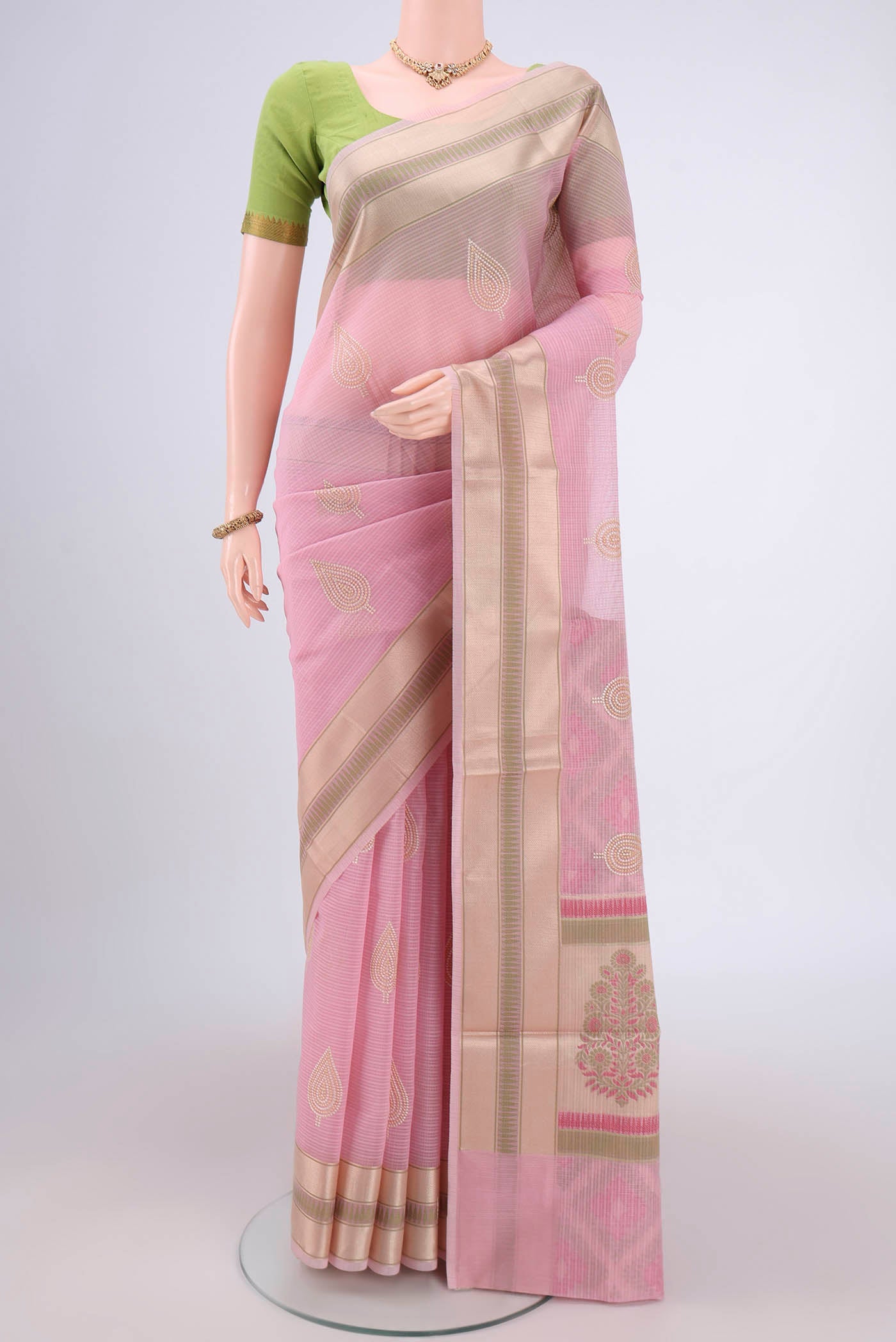 Rose pink Blended Kota Cotton Saree with Embroidery on the body and Zari Border.  displayed on a mannequin
