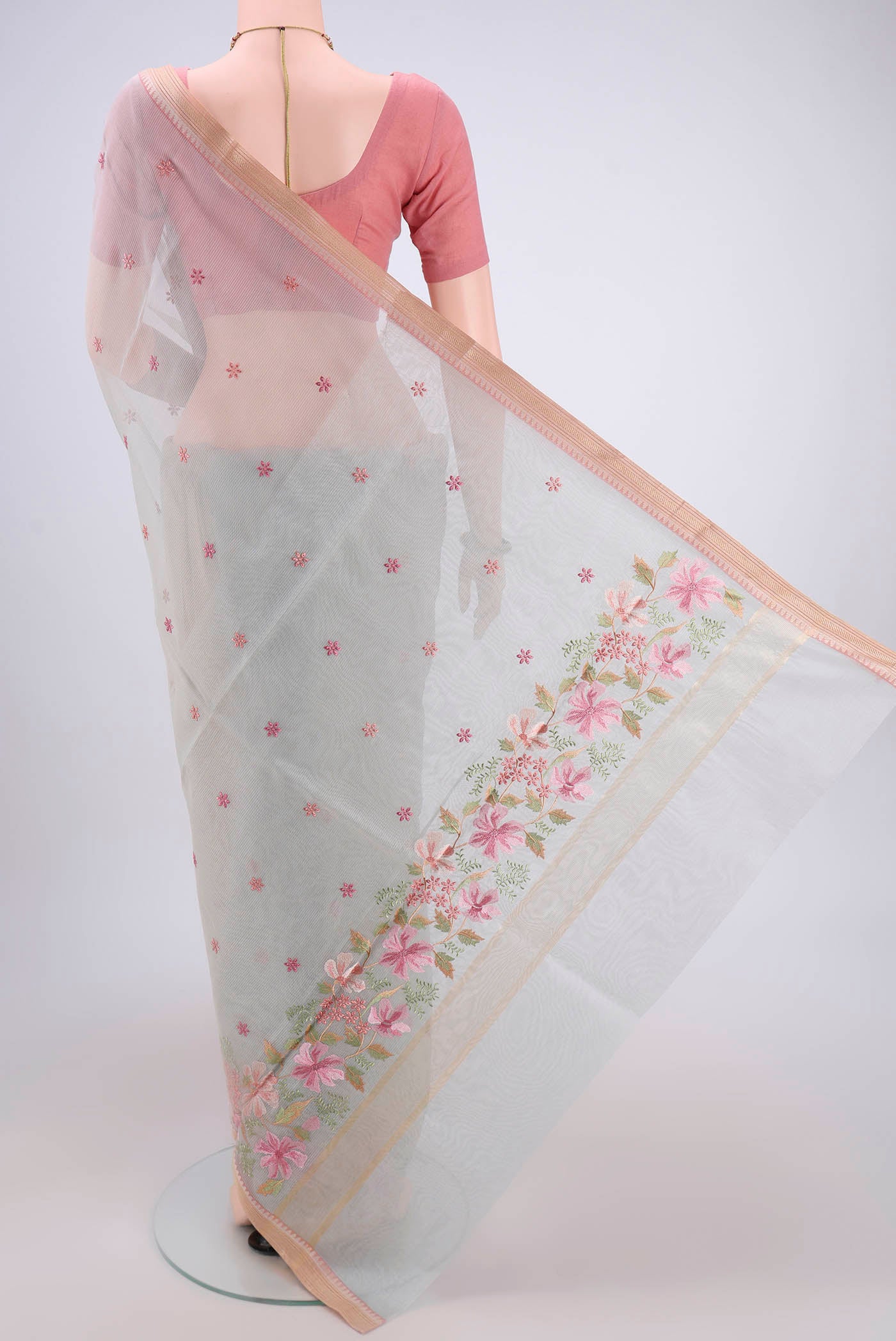 Flat view of Grey Blended Kota Cotton Saree with Embroidery on the body and Zari Border. 