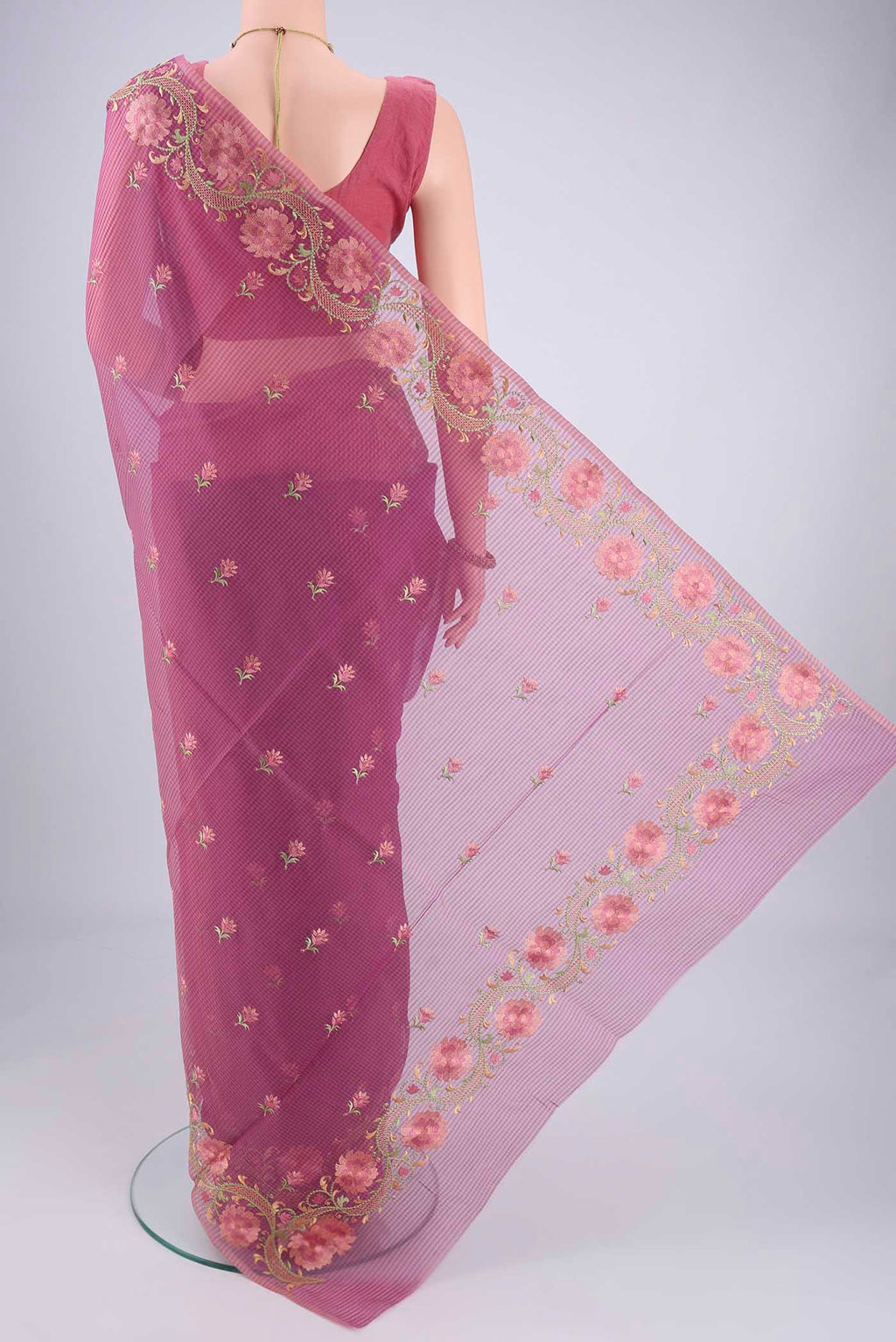 Flat view of Magenta Blended Kota Cotton Saree with Embroidery on the body and Temple Border. 