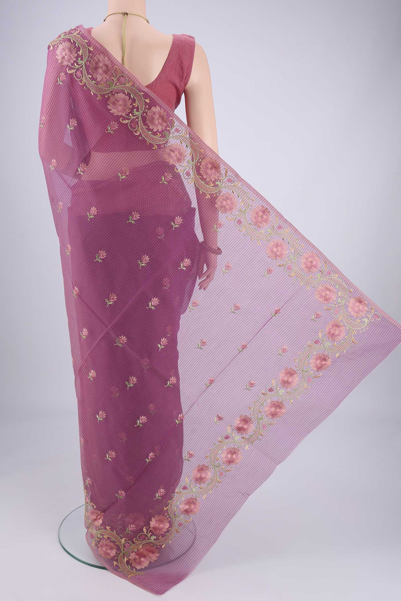 Flat view of Magenta Blended Kota Cotton Saree with Embroidery on the body and Temple Border. 