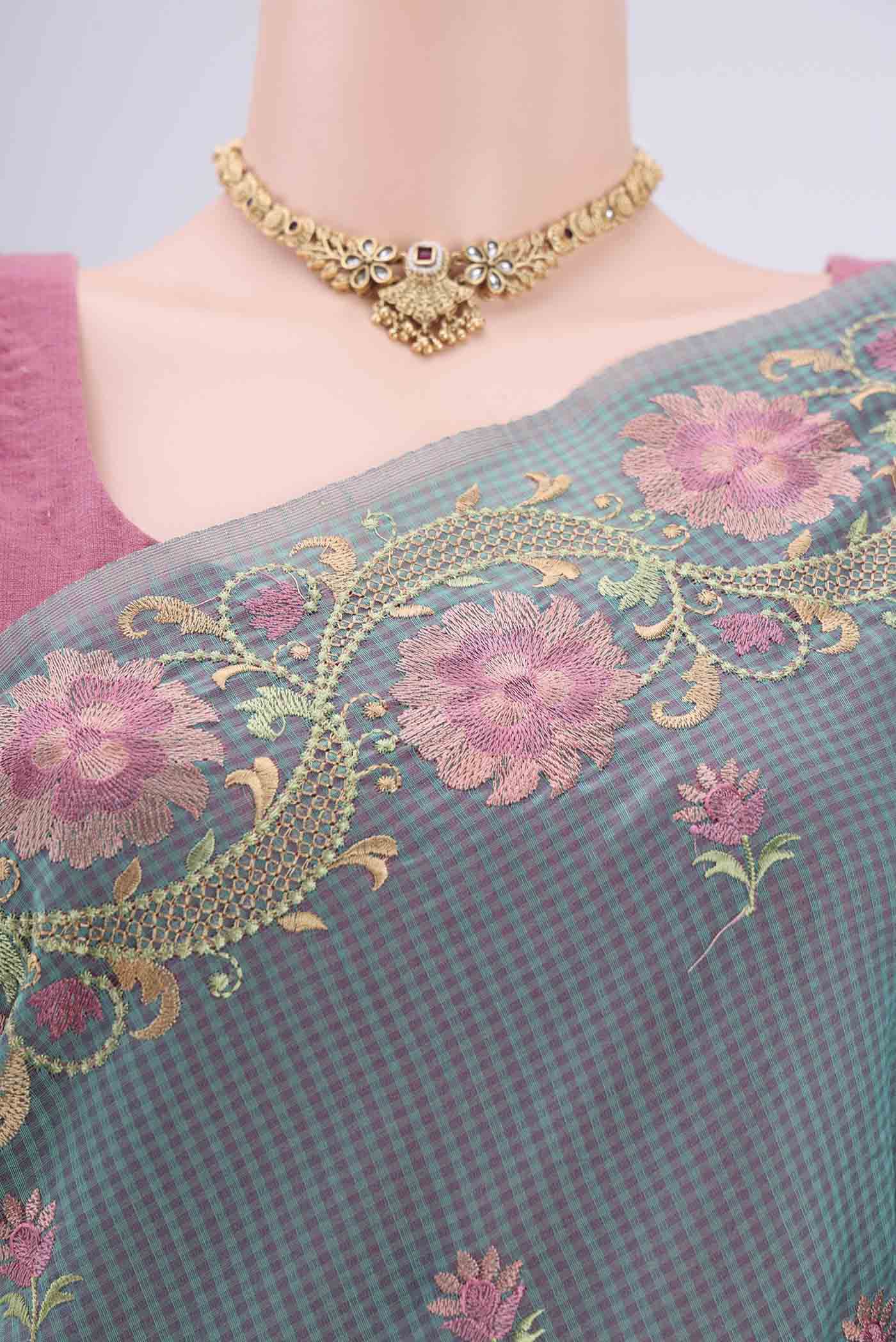 Border image of Sea Green Blended Kota Cotton Saree with Embroidery on the body and Embroidery Border. 