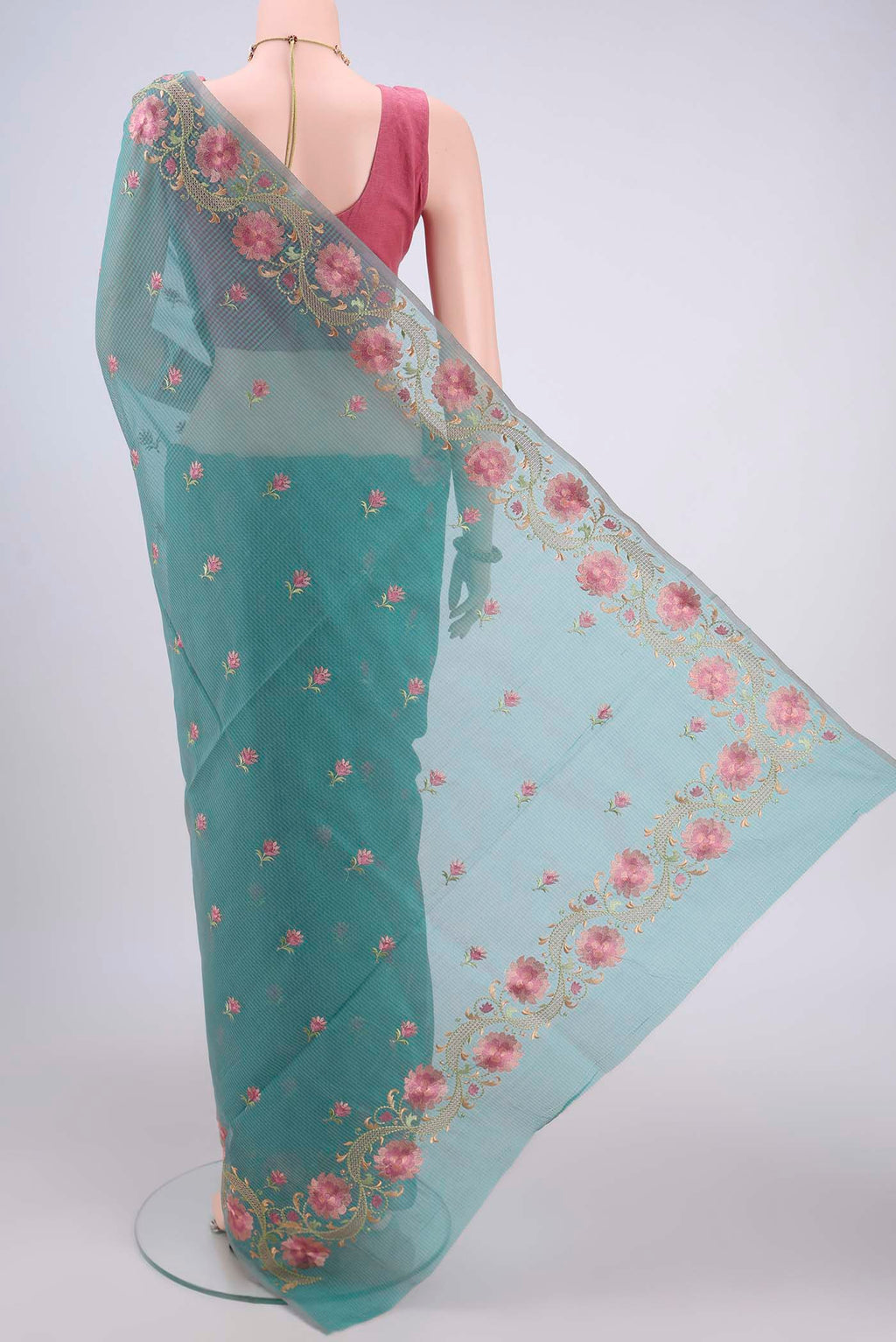 Flat view of Sea Green Blended Kota Cotton Saree with Embroidery on the body and Embroidery Border. 