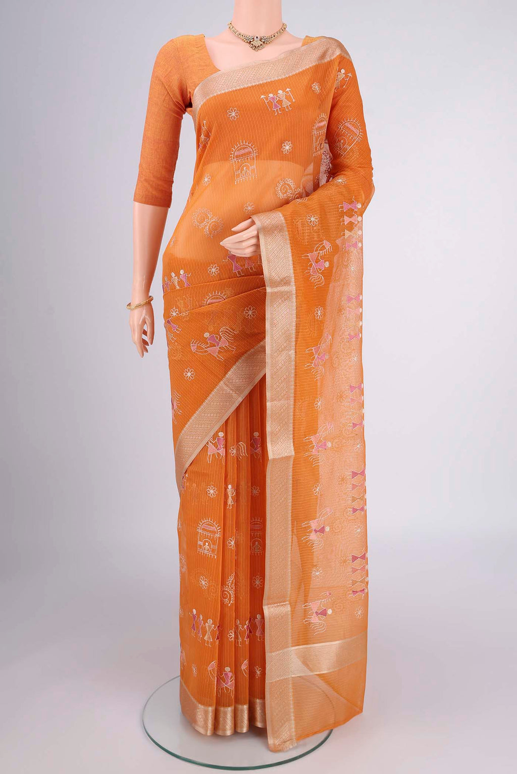 Brick Orange Dual Tone Blended Kota Cotton Saree with Embroidery on the body and Zari Border.  displayed on a mannequin