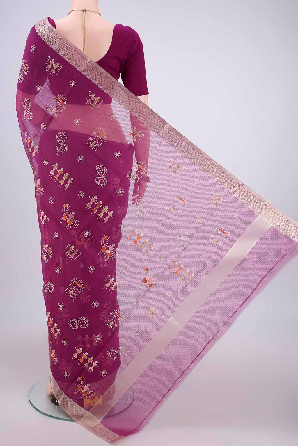 Flat view of Magenta Blended Kota Cotton Saree with Embroidery on the body and Zari Border. 