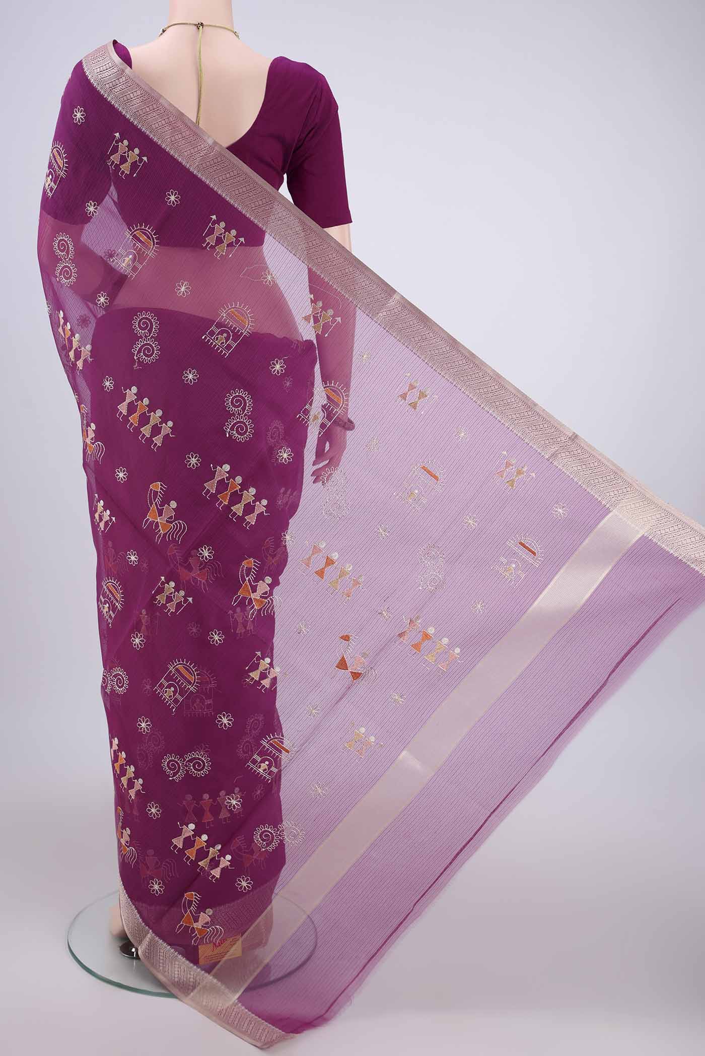 Flat view of Magenta Blended Kota Cotton Saree with Embroidery on the body and Zari Border. 