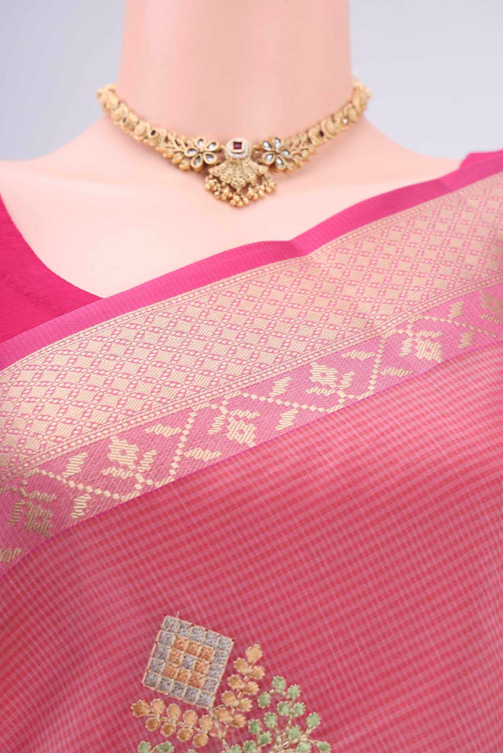 Border image of Pink Blended Kota Cotton Saree with Embroidery on the body and Zari Border. 