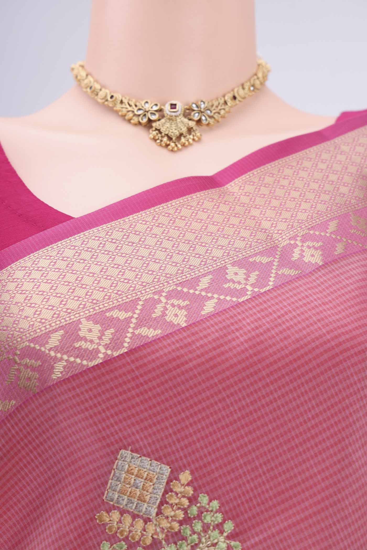 Border image of Pink Blended Kota Cotton Saree with Embroidery on the body and Zari Border. 