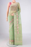 Light Green Blended Kota Cotton Saree with Embroidery on the body and Zari Border.  displayed on a mannequin
