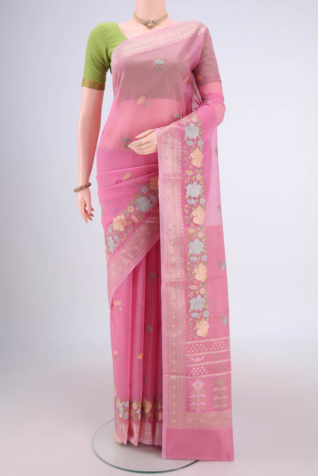 Rose pink Blended Kota Cotton Saree with Embroidery on the body and Zari Border.  displayed on a mannequin
