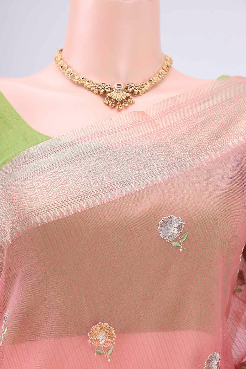 Border image of Peach Blended Kota Cotton Saree with Embroidery on the body and Zari Border. 