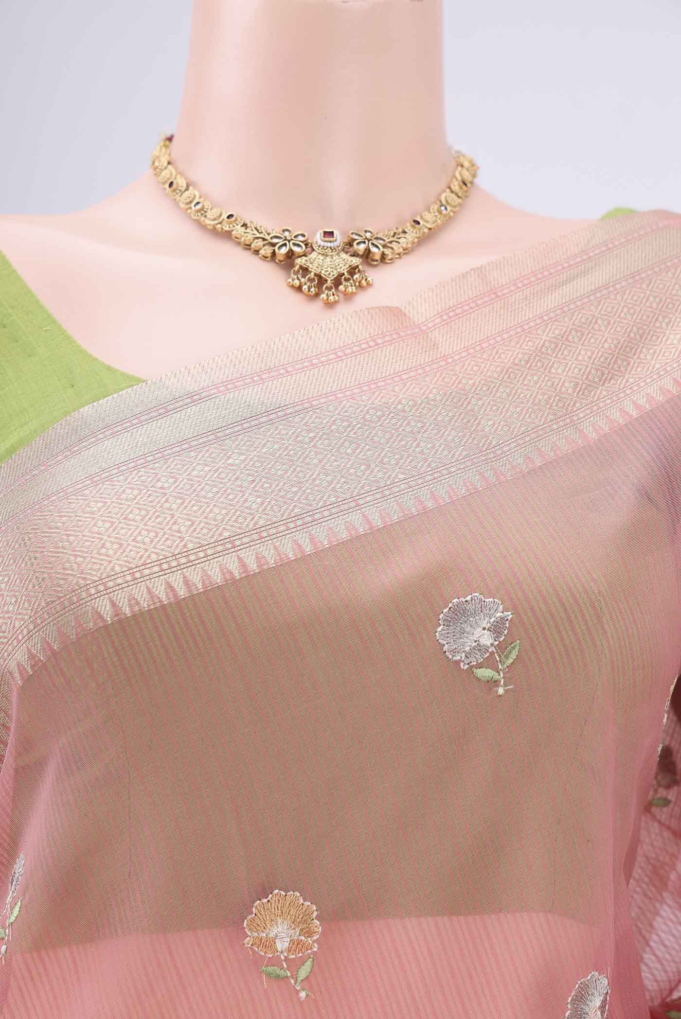 Border image of Peach Blended Kota Cotton Saree with Embroidery on the body and Zari Border. 