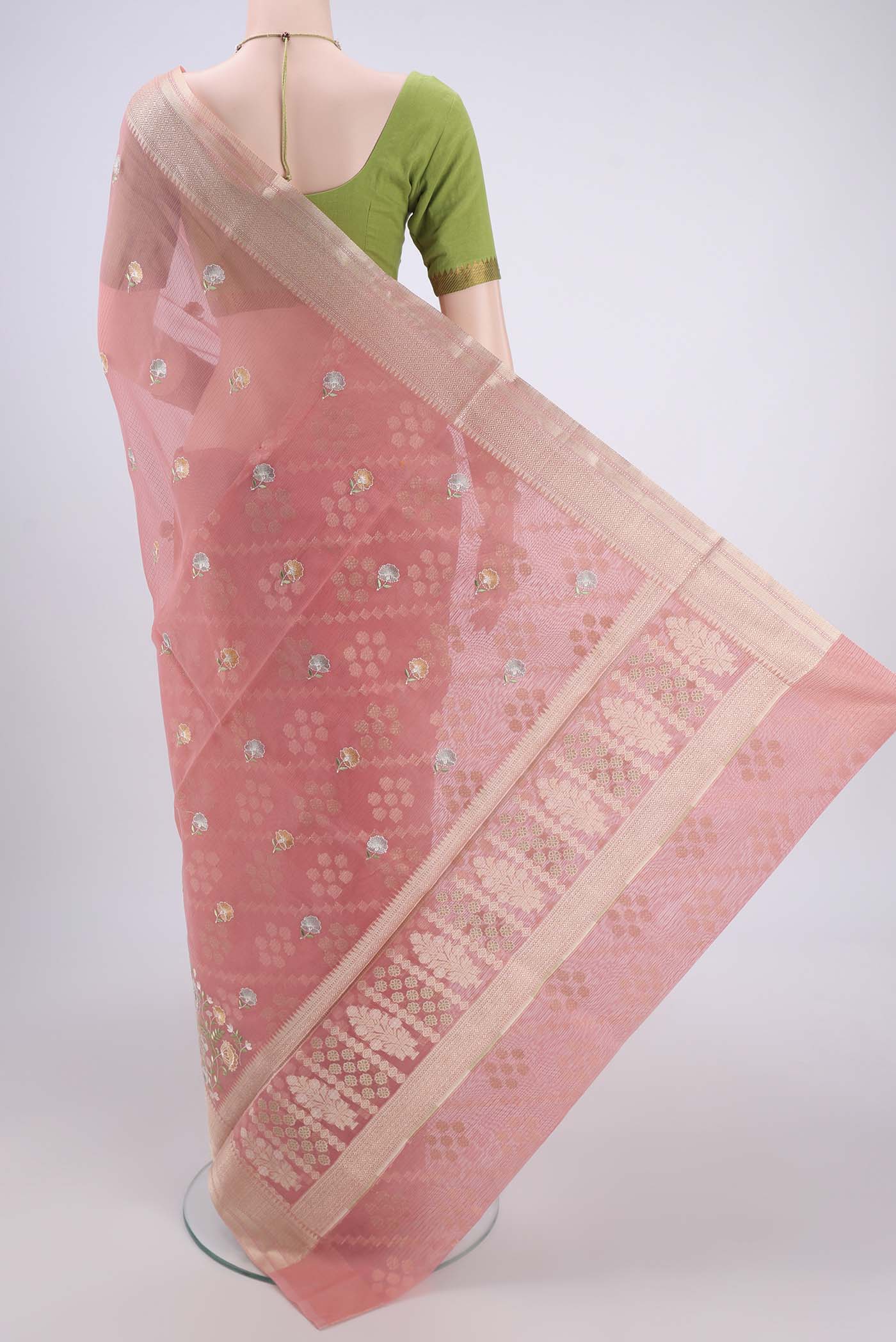 Flat view of Peach Blended Kota Cotton Saree with Embroidery on the body and Zari Border. 