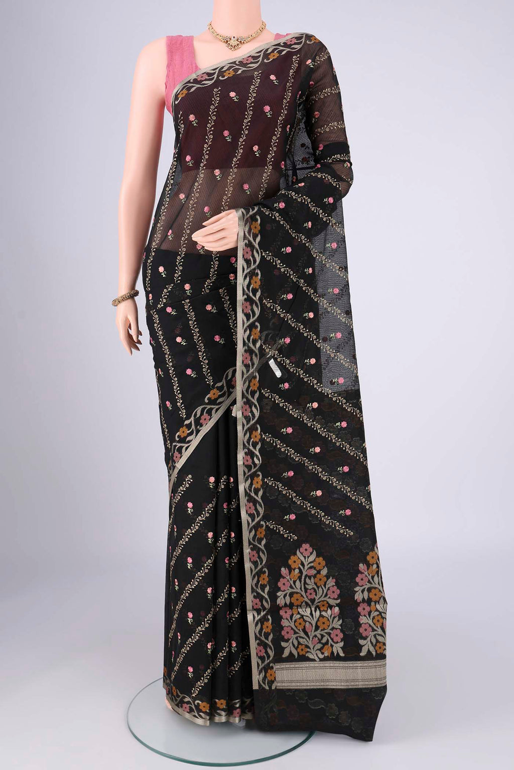 Black Blended Kota Cotton Saree with Embroidery on the body and Zari Border.  displayed on a mannequin