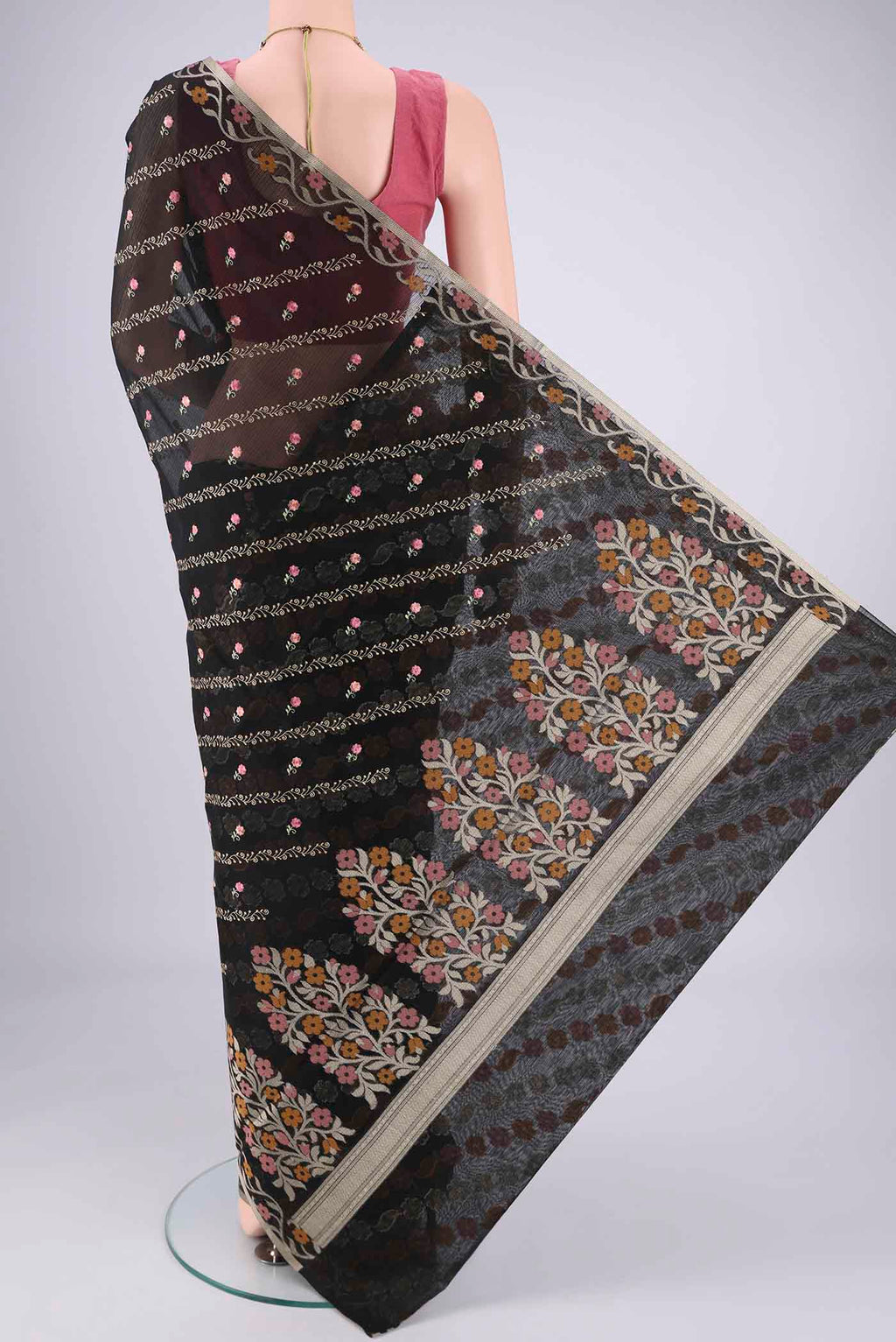 Flat view of Black Blended Kota Cotton Saree with Embroidery on the body and Zari Border. 