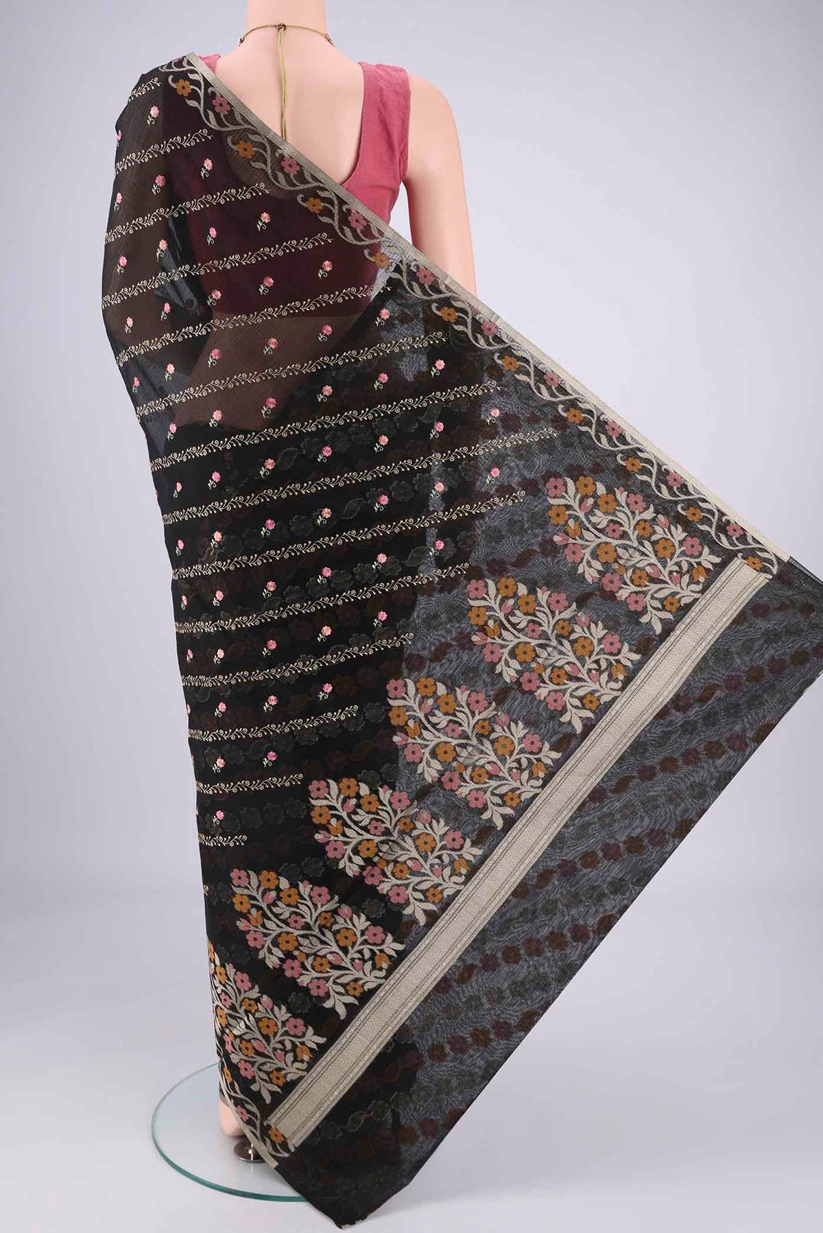 Flat view of Black Blended Kota Cotton Saree with Embroidery on the body and Zari Border. 