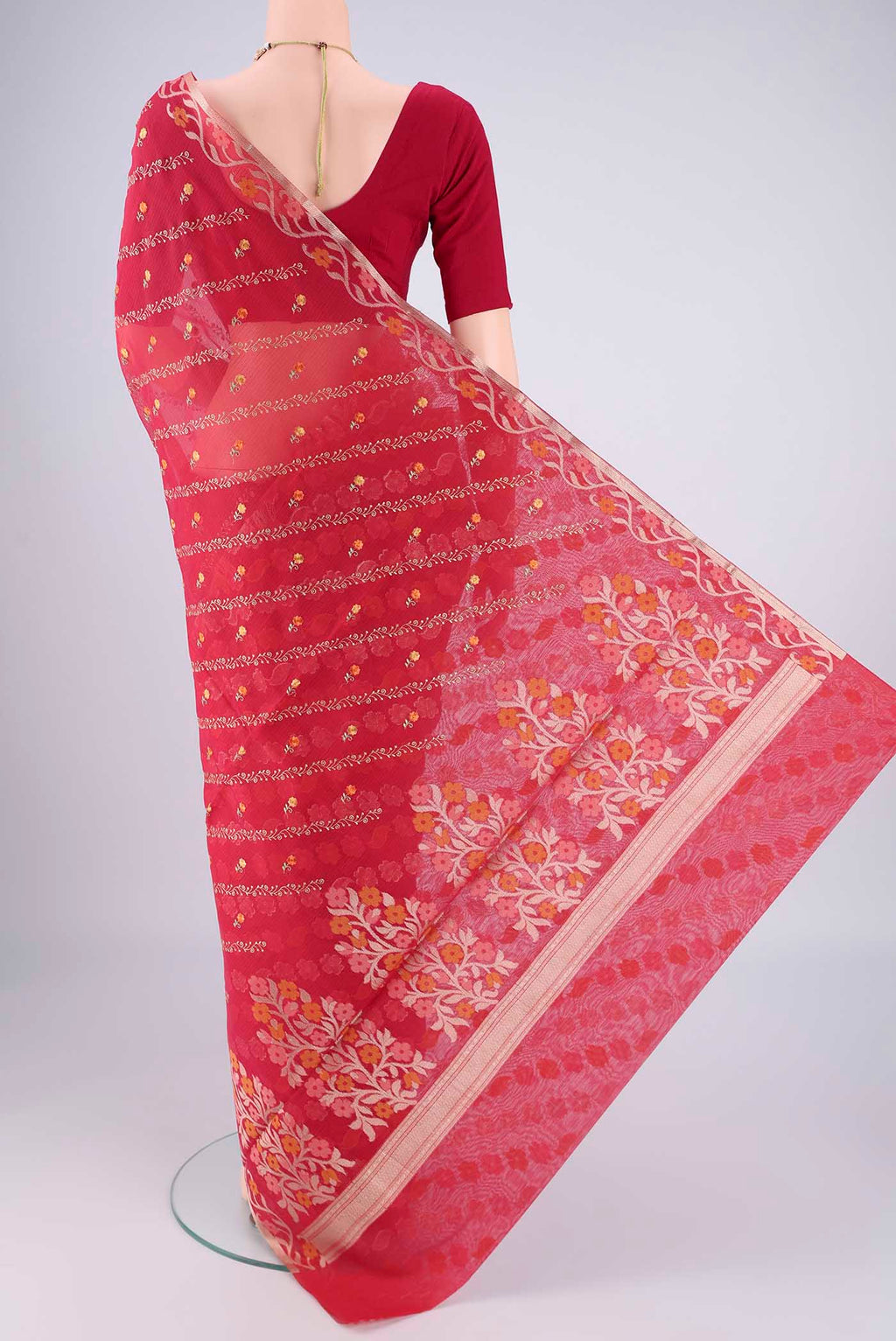 Flat view of Red Blended Kota Cotton Saree with Embroidery on the body and Zari Border. 
