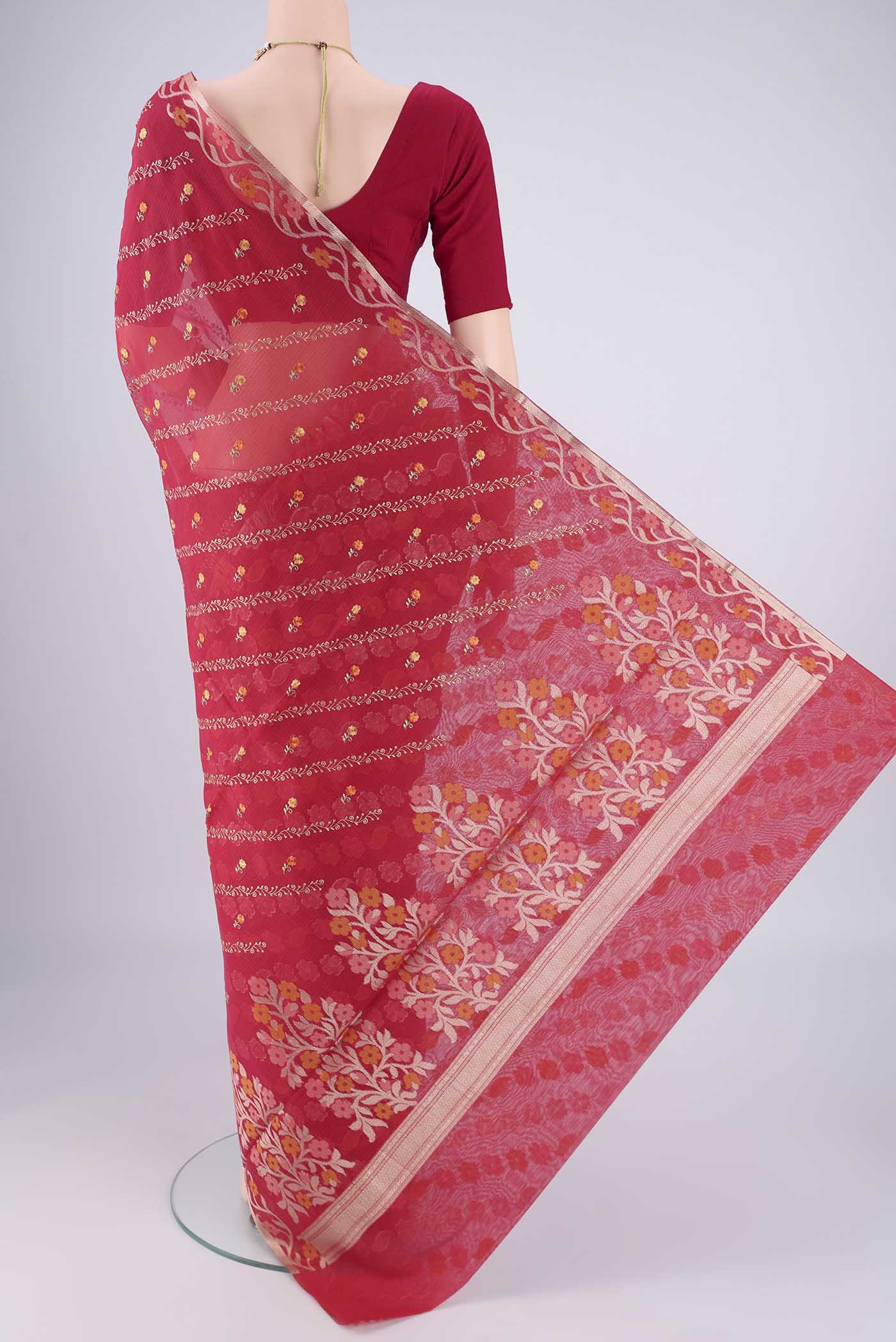 Flat view of Red Blended Kota Cotton Saree with Embroidery on the body and Zari Border. 