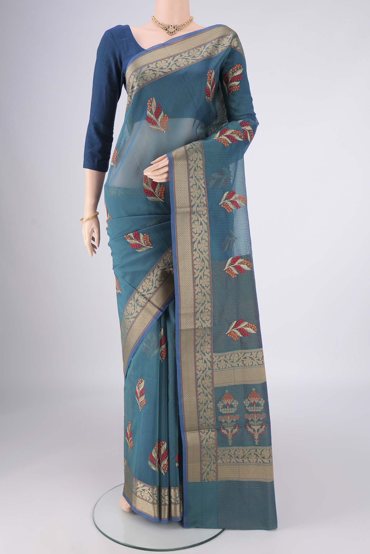 Green with Red Dual Tone Blended Kota Cotton Saree with Embroidery on the body and Thread Border.  displayed on a mannequin