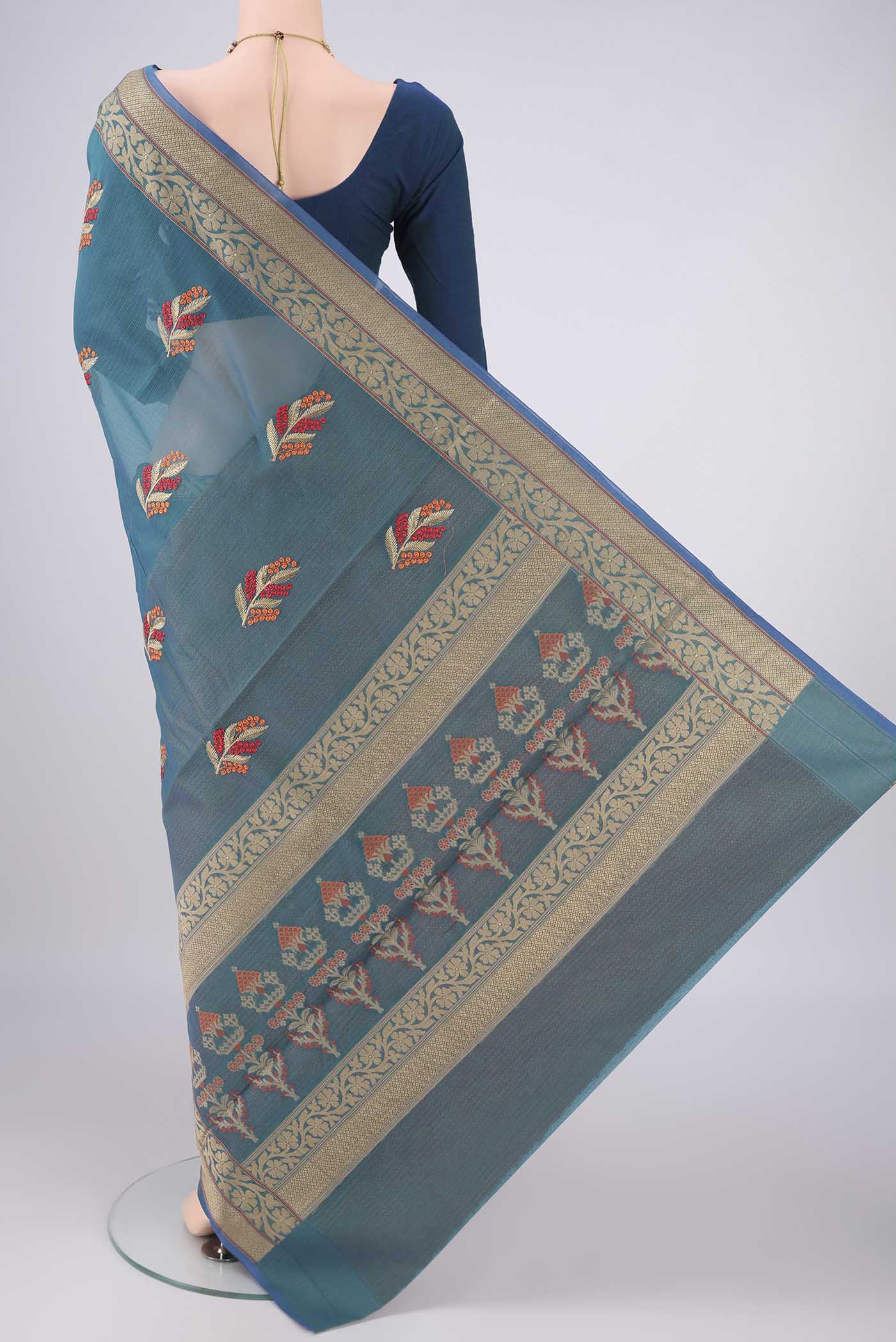 Flat view of Green with Red Dual Tone Blended Kota Cotton Saree with Embroidery on the body and Thread Border. 