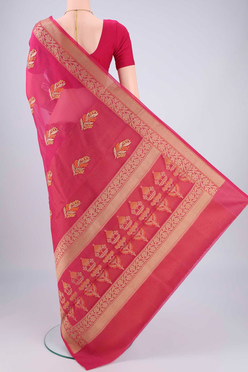 Flat view of Rani Pink Blended Kota Cotton Saree with Embroidery on the body and Thread Border. 