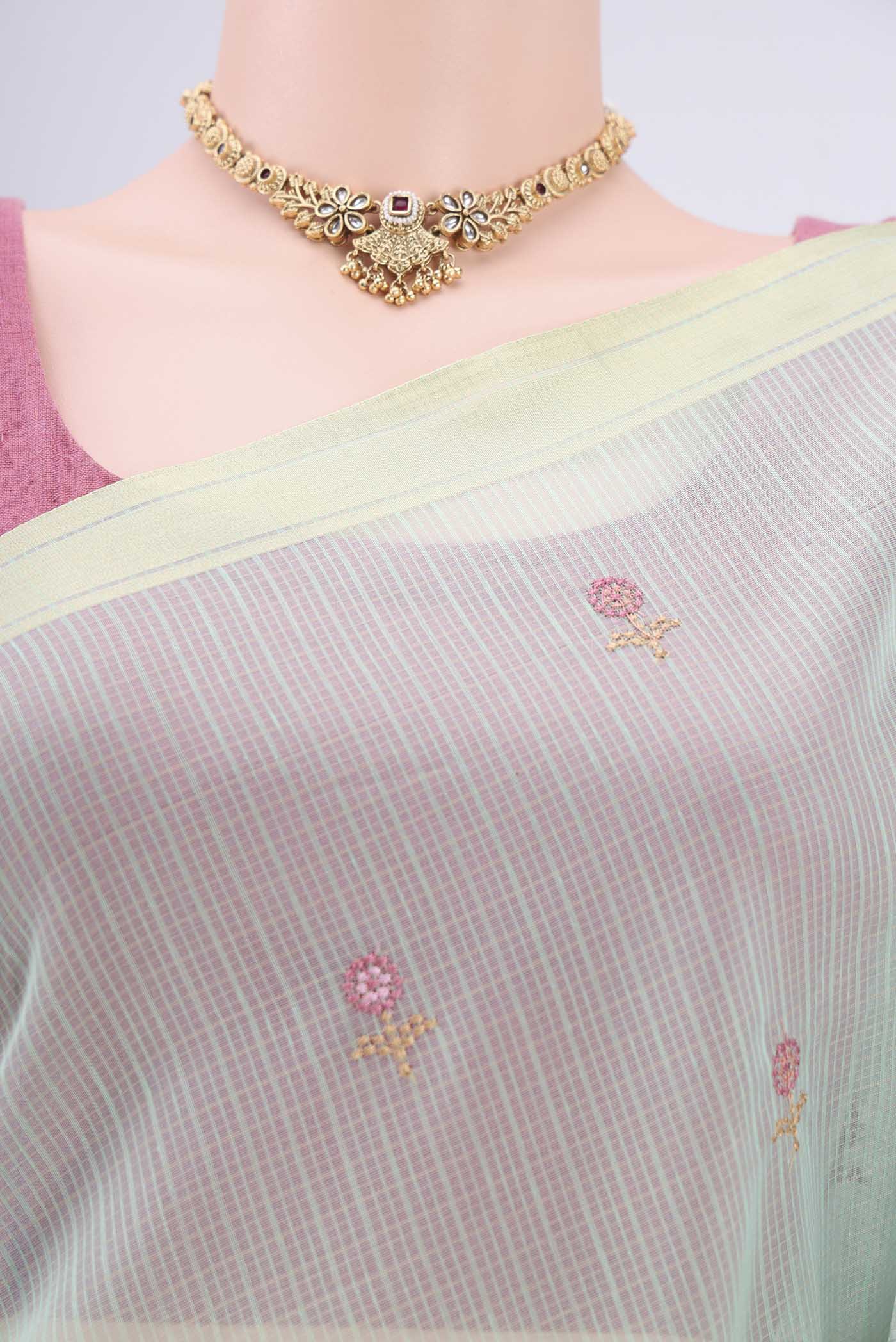 Border image of Mint Green Blended Kota Cotton Saree with Embroidery on the body and Zari Border. 
