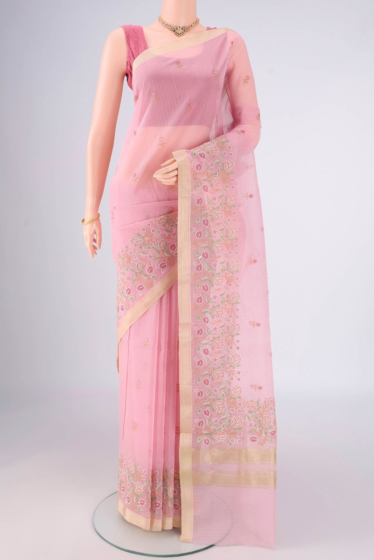 Rose pink Dual Tone Blended Kota Cotton Saree with Embroidery on the body and Zari Border.  displayed on a mannequin