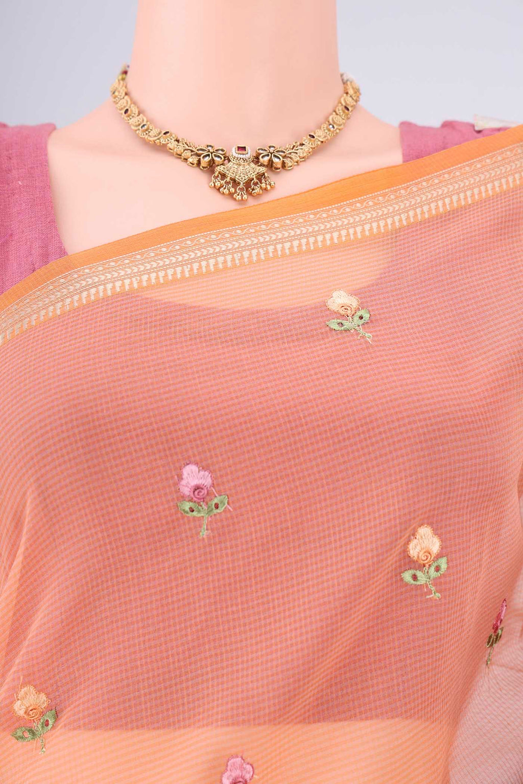 Border image of Orange Blended Kota Cotton Saree with Embroidery on the body and Thread Border. 