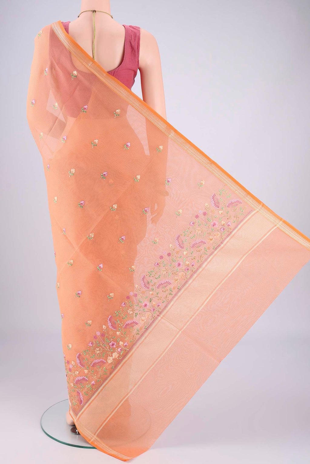 Flat view of Orange Blended Kota Cotton Saree with Embroidery on the body and Thread Border. 