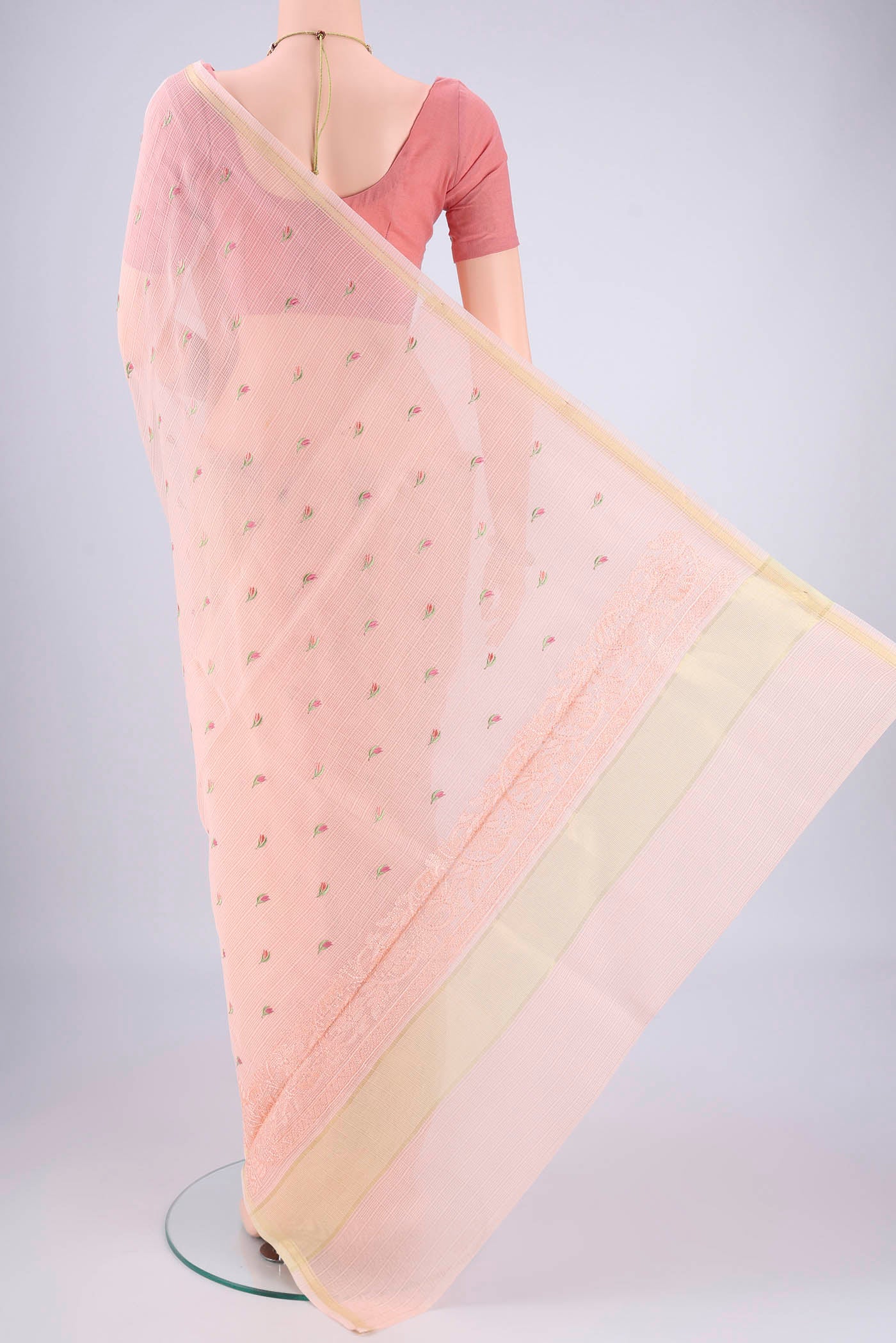 Flat view of Peach Blended Kota Cotton Saree with Embroidery on the body and Checks Border. 