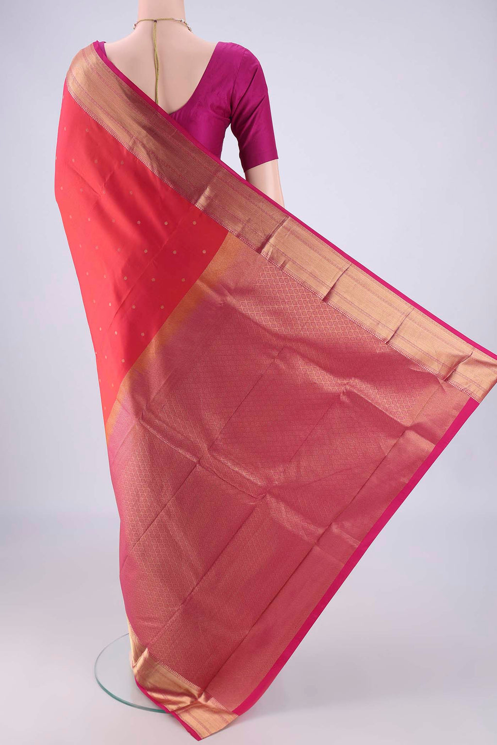Flat view of Dark Pink Dual Tone Kanchipuram Silk Saree with Plain Body and Zari Border. 