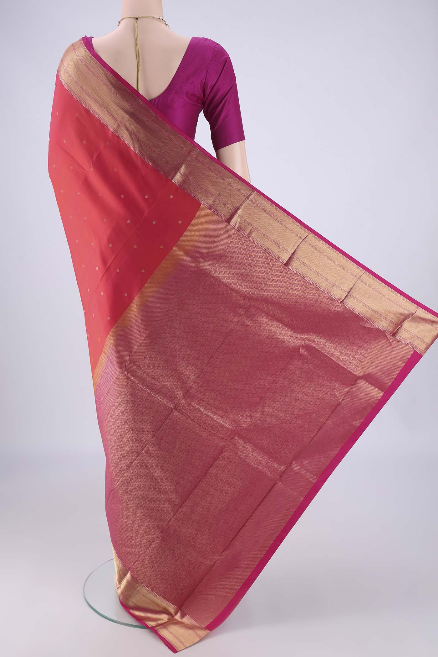 Flat view of Dark Pink Dual Tone Kanchipuram Silk Saree with Plain Body and Zari Border. 