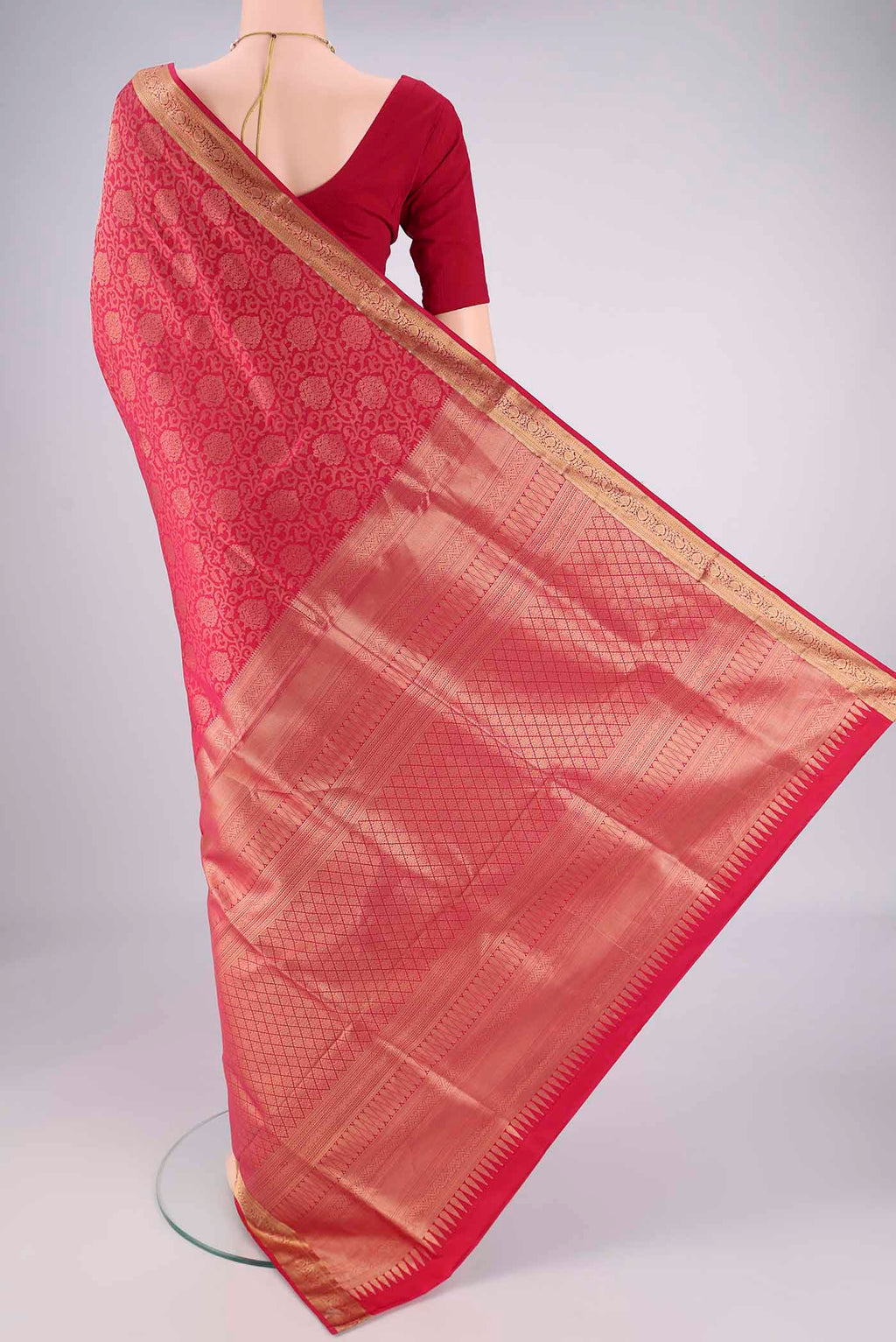Flat view of Dark Pink Soft Silk Saree with Zari Brocade on the body and Zari Border. 