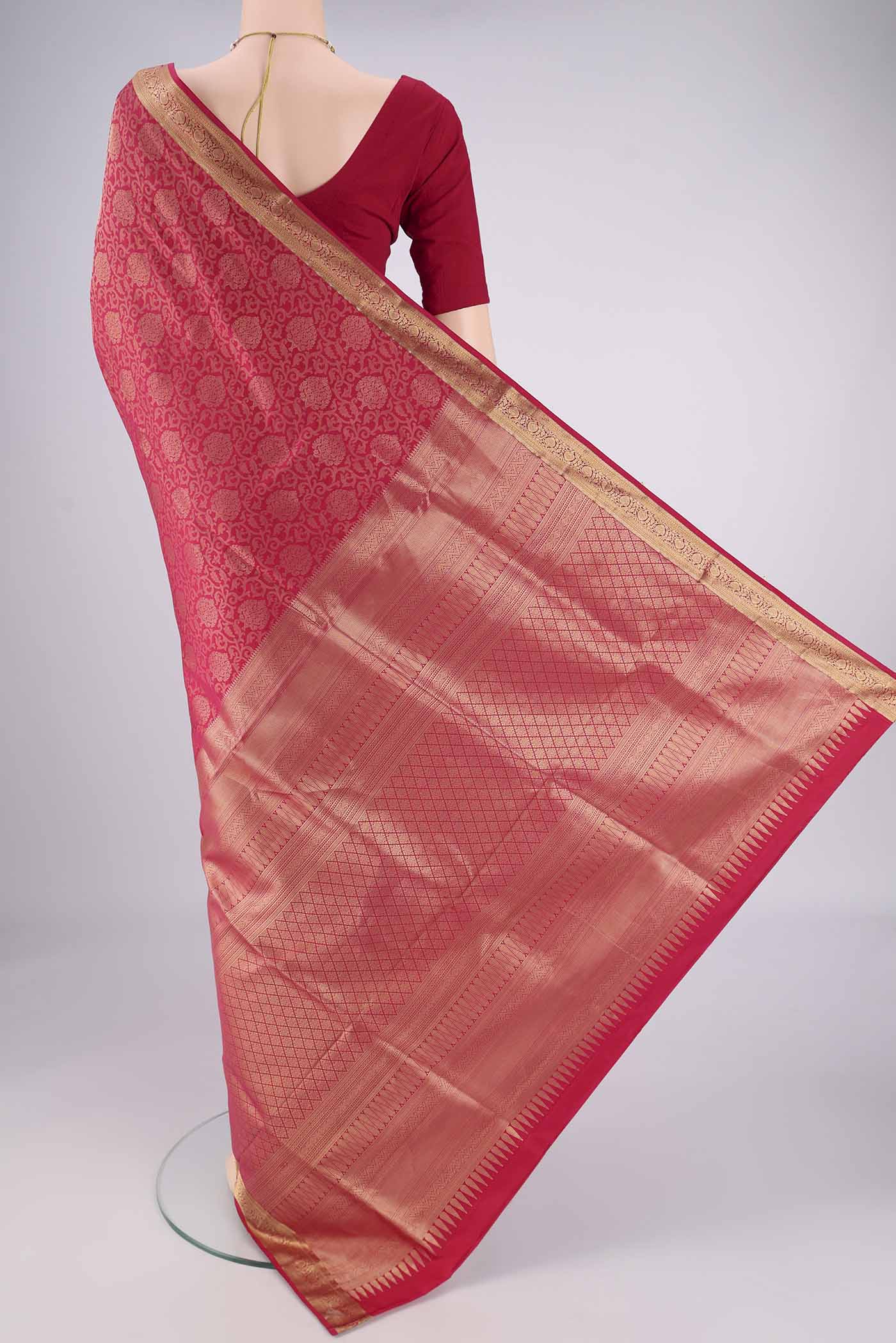 Flat view of Dark Pink Soft Silk Saree with Zari Brocade on the body and Zari Border. 