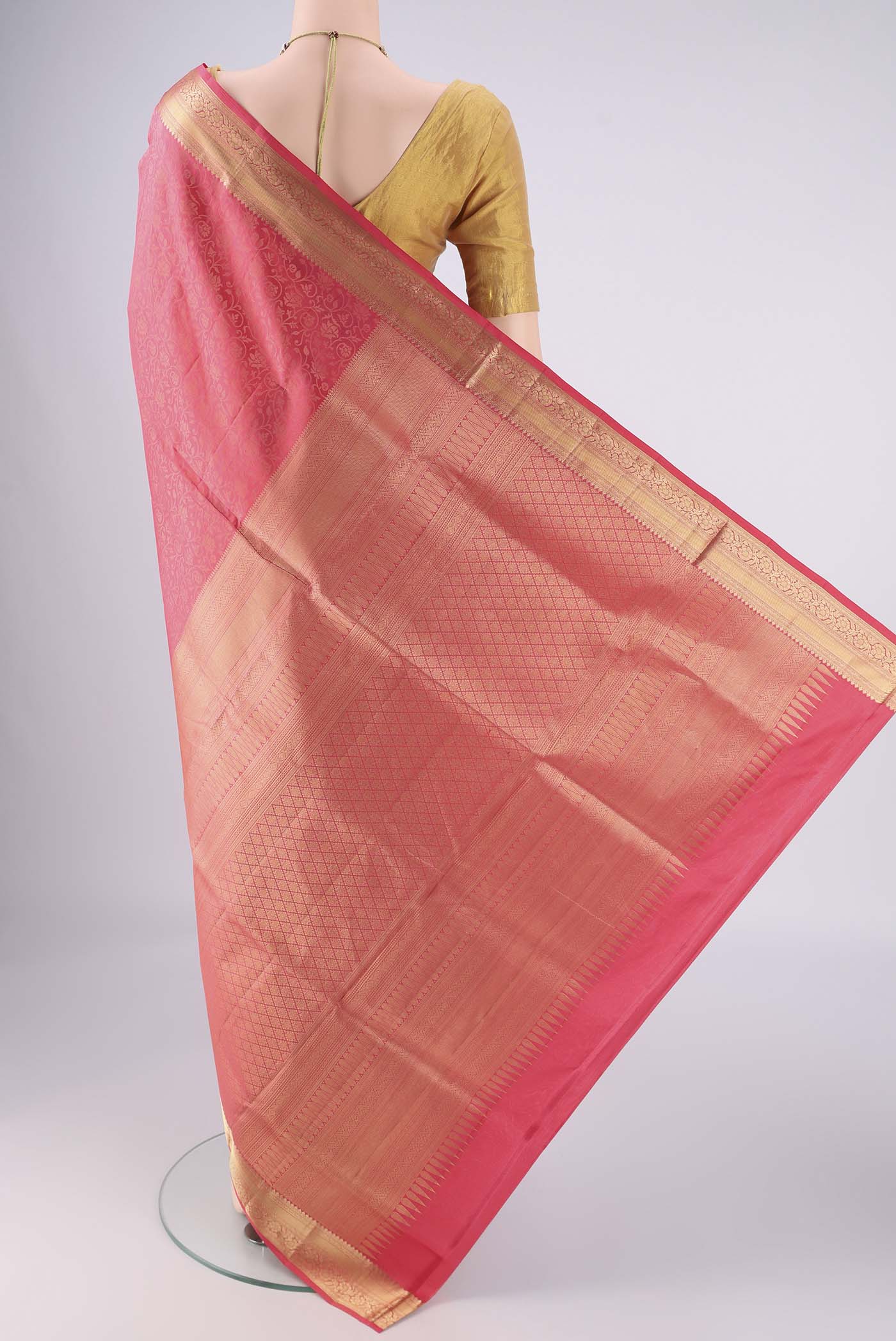 Flat view of Coral Dual Tone Soft Silk Saree with Zari Brocade on the body and Zari Border. 