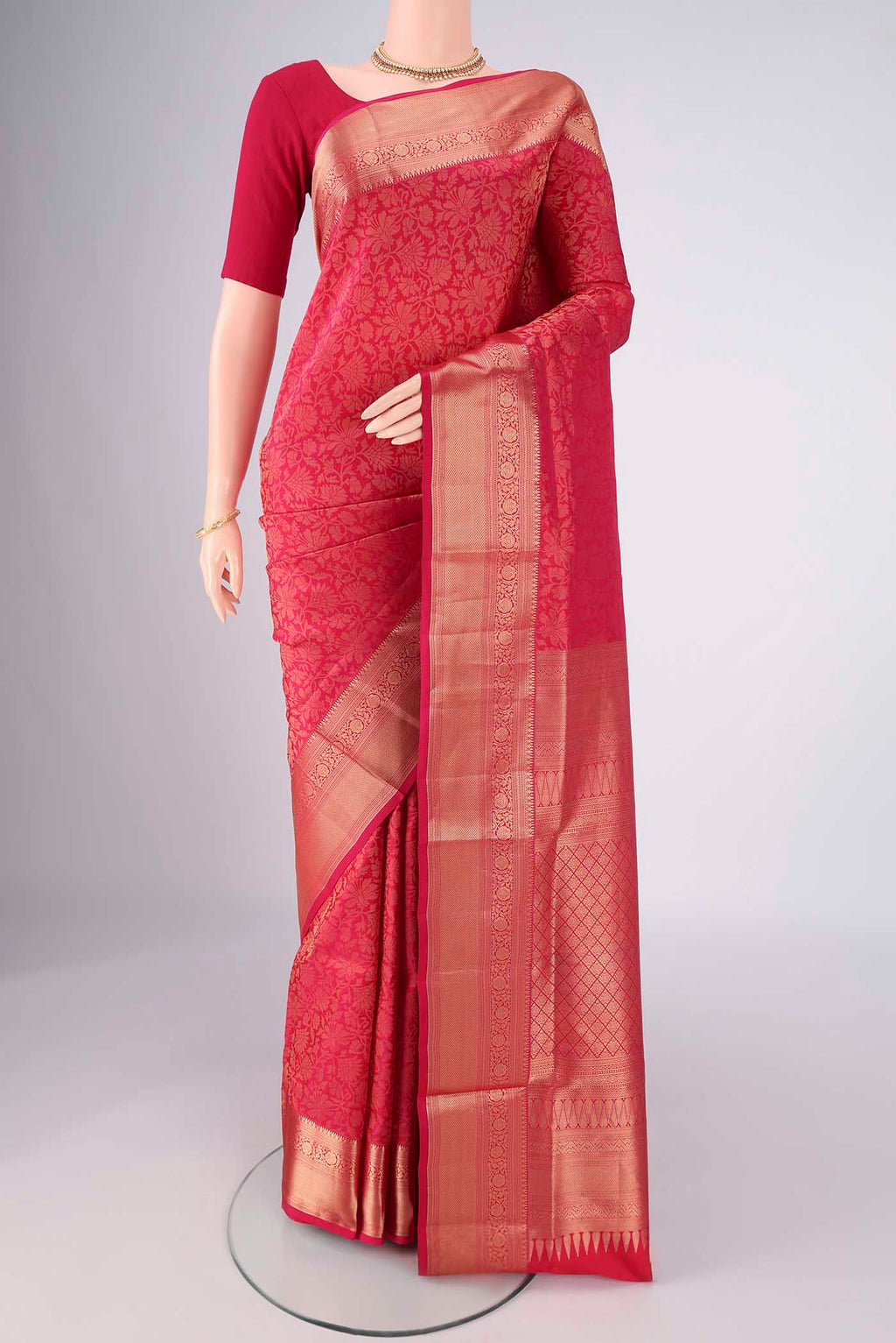 Dark Pink Soft Silk Saree with Zari Brocade on the body and Zari Border.  displayed on a mannequin