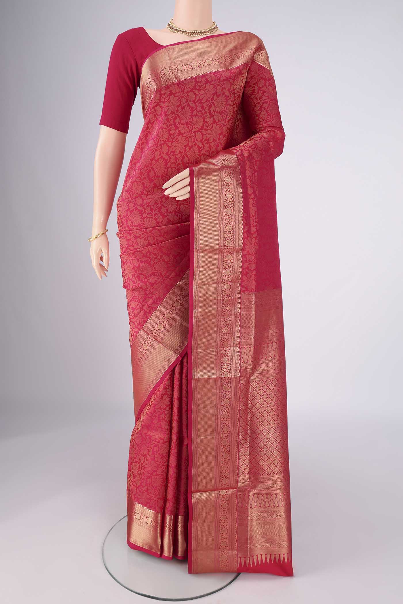 Dark Pink Soft Silk Saree with Zari Brocade on the body and Zari Border.  displayed on a mannequin